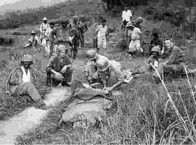 A Korean War Medic Tending To A Wounded Soldier Ghost Flames: Life And Death In A Hidden War Korea 1950 1953